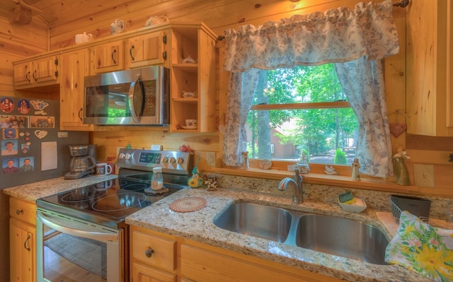 15 June Marie Ln, Murphy, NC 28906 - kitchen with stainless steel appliances, a sink, light stone countertops, and open shelves
