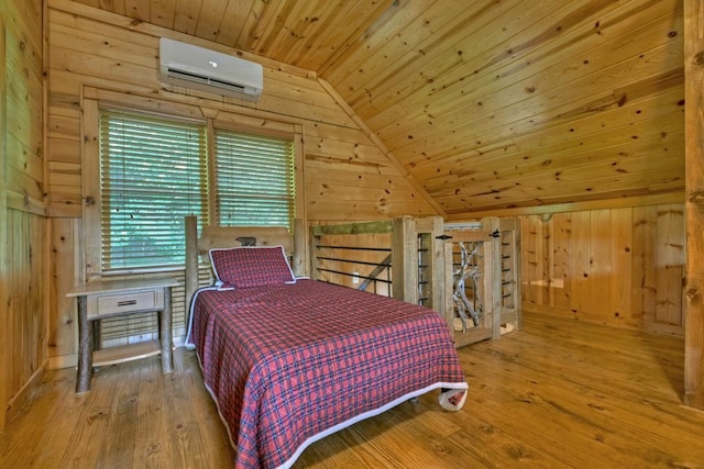 bedroom featuring lofted ceiling, wood walls, hardwood / wood-style flooring, wooden ceiling, and a wall mounted air conditioner