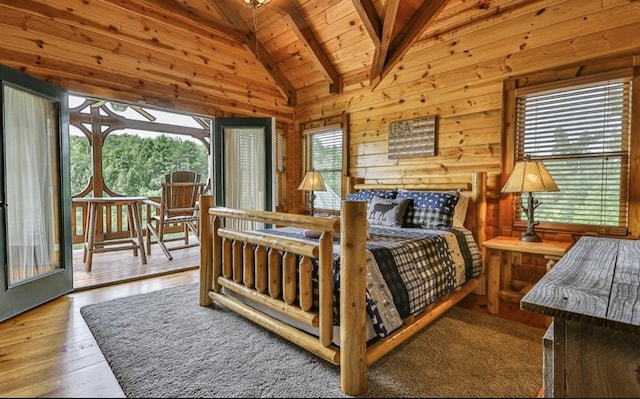 bedroom with wood ceiling, wood-type flooring, wooden walls, high vaulted ceiling, and beam ceiling