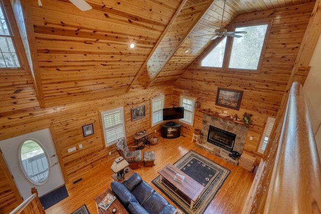 2478 Hi River Rd, Hiawassee, GA 30546 - living room featuring wooden ceiling, wooden walls, and a ceiling fan