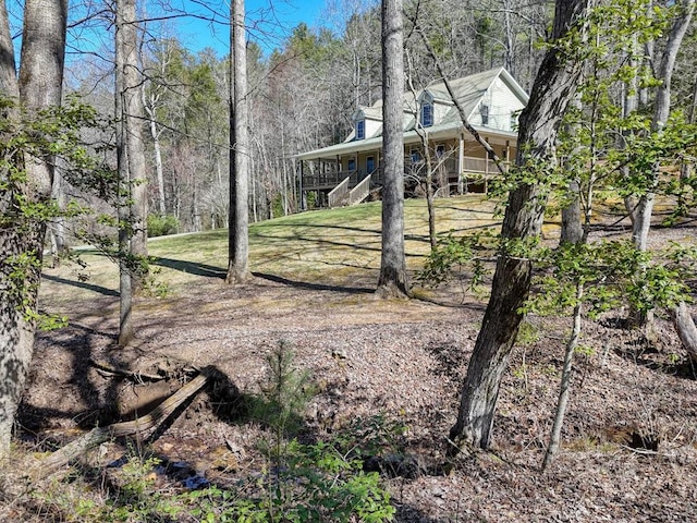2478 Hi River Rd, Hiawassee, GA 30546 - view of yard with a wooded view and covered porch