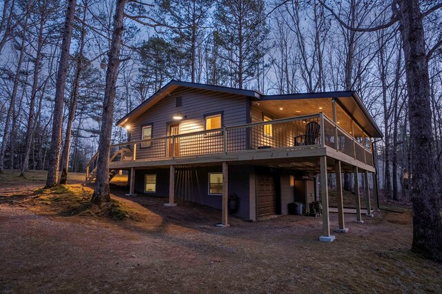 view of front of house featuring a wooden deck