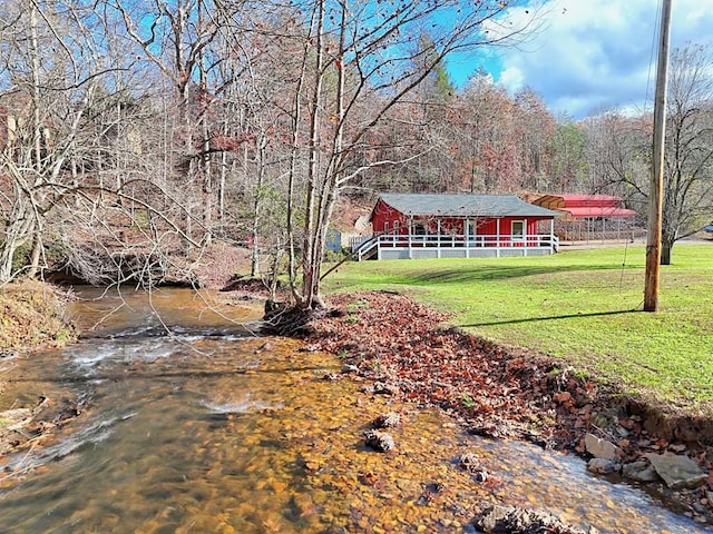 view of yard with a water view