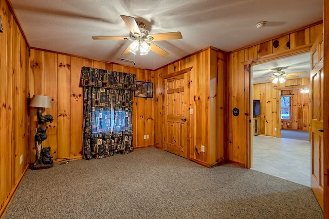 539 Nicholson Trl, Hiawassee, GA 30546 - carpeted empty room featuring ceiling fan, wood walls, and a smoke detector
