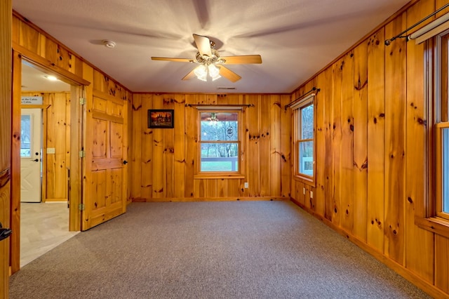 539 Nicholson Trl, Hiawassee, GA 30546 - unfurnished room featuring carpet floors, a ceiling fan, baseboards, wood walls, and a smoke detector