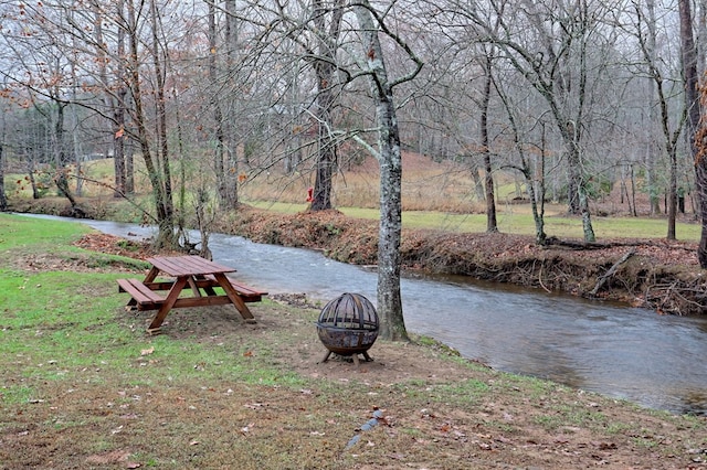 539 Nicholson Trl, Hiawassee, GA 30546 - view of green lawn with an outdoor fire pit