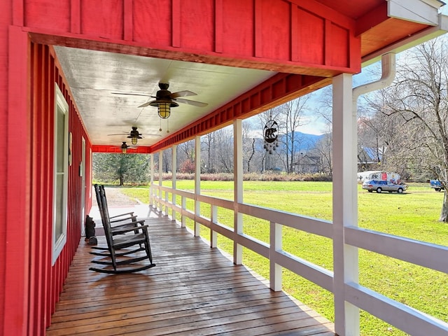 539 Nicholson Trl, Hiawassee, GA 30546 - wooden porch with ceiling fan and a yard