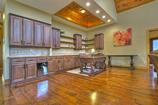 kitchen featuring open shelves, backsplash, dark wood finished floors, and wood ceiling