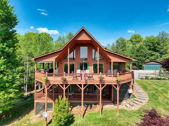 246 Serenity Pointe Dr, Murphy, NC 28906 - back of property featuring a lawn, an outdoor structure, and a deck