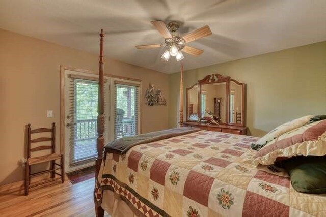 246 Serenity Pointe Dr, Murphy, NC 28906 - bedroom with a ceiling fan, access to exterior, and wood finished floors
