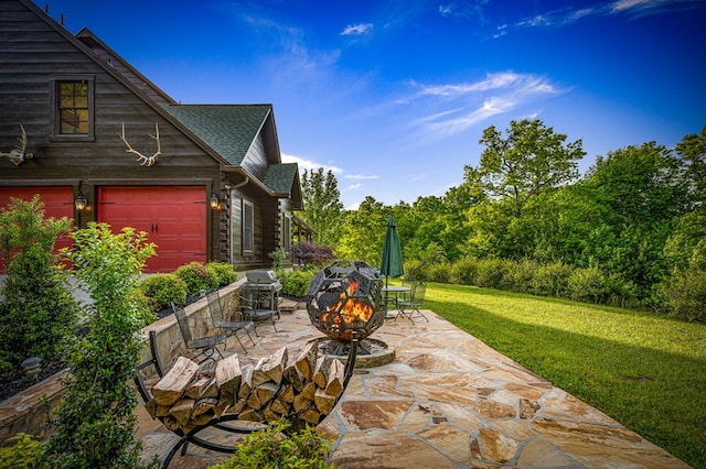 view of patio with a fire pit and area for grilling