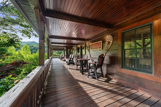 wooden terrace with covered porch