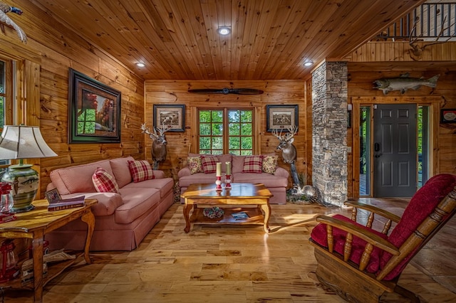 living room featuring wooden walls, hardwood / wood-style flooring, recessed lighting, and wooden ceiling