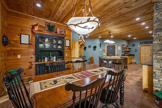 dining room featuring wood ceiling, recessed lighting, and tile patterned flooring