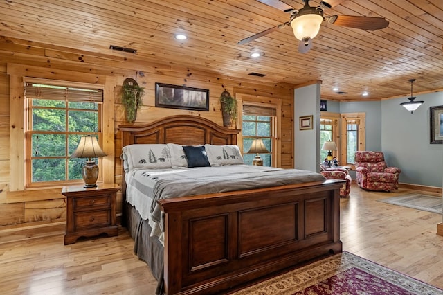 bedroom featuring light wood-style flooring, recessed lighting, and baseboards