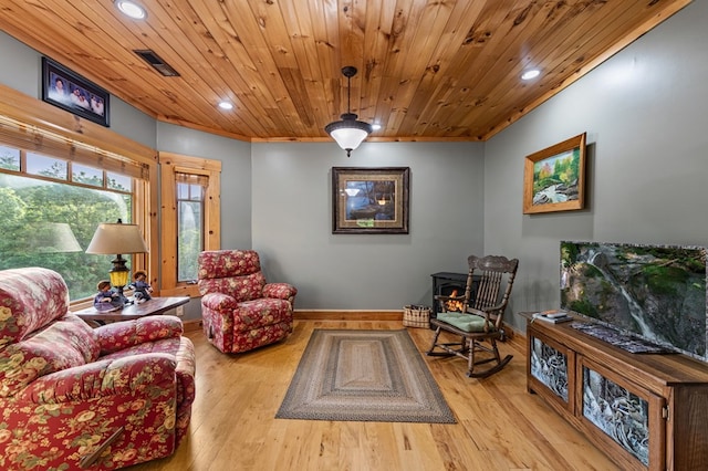 sitting room featuring recessed lighting, wood finished floors, baseboards, and wood ceiling