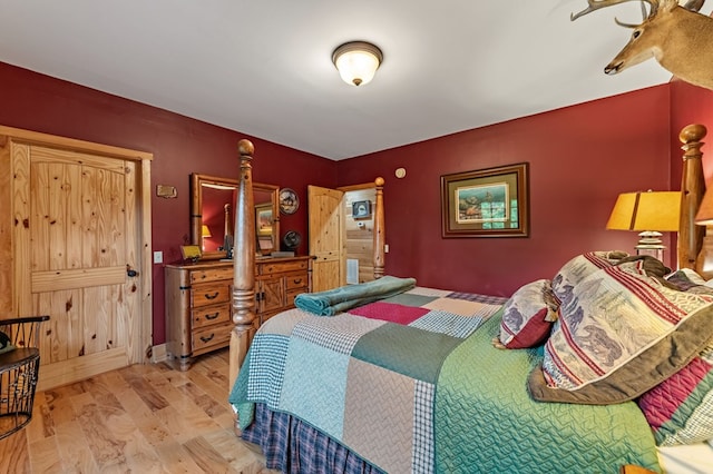 bedroom featuring wood finished floors