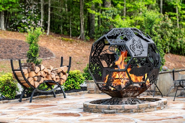 view of patio featuring a fire pit
