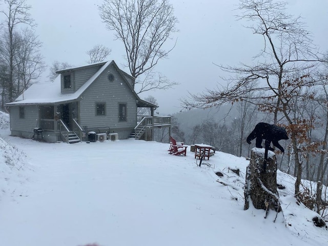 view of snow covered property