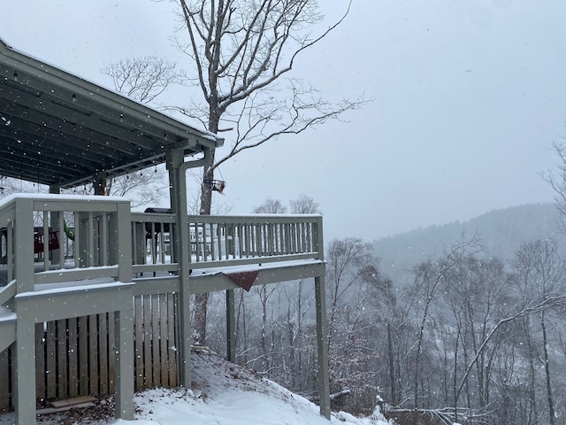 view of snow covered deck