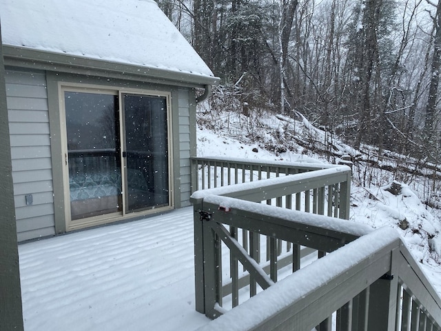 view of snow covered deck