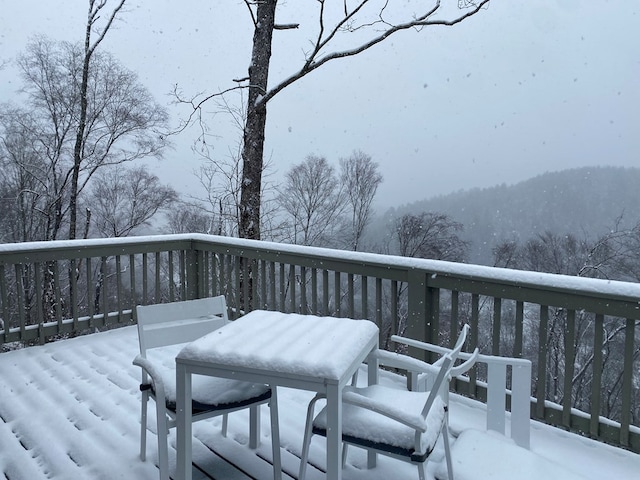 view of snow covered deck