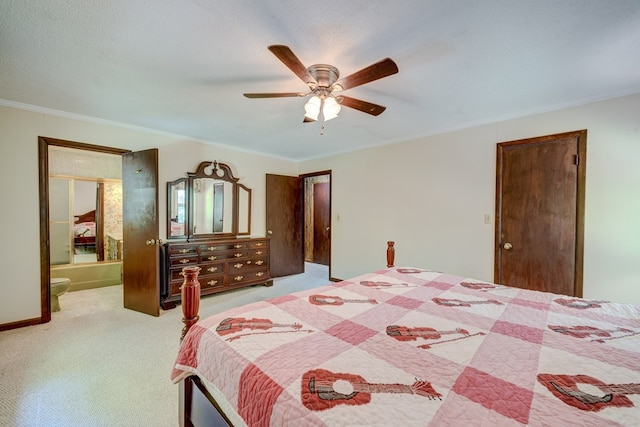 bedroom with light colored carpet, crown molding, ensuite bathroom, and a ceiling fan
