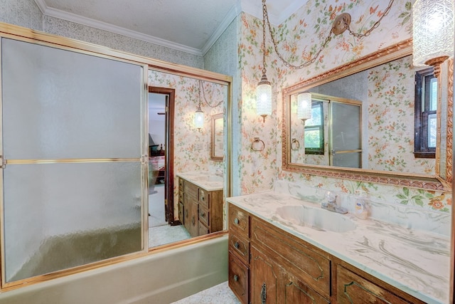 bathroom with wallpapered walls, a wealth of natural light, vanity, and ornamental molding