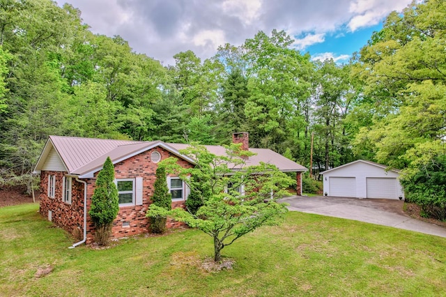 ranch-style house with crawl space, a chimney, a front lawn, an outbuilding, and a detached garage