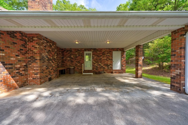 view of vehicle parking featuring a carport