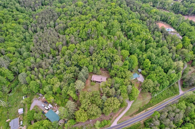 bird's eye view featuring a forest view