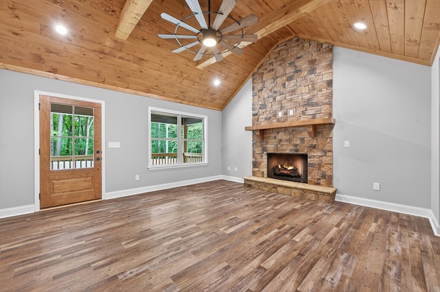 89 Pamela Ct, Ellijay, GA 30540 - unfurnished living room featuring a wooden ceiling with exposed beams, a ceiling fan, wood finished floors, a stone fireplace, and recessed lighting
