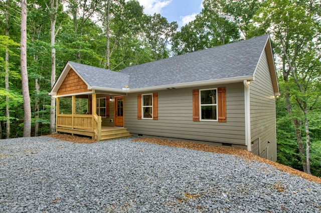 89 Pamela Ct, Ellijay, GA 30540 - view of front of property with crawl space, a shingled roof, gravel driveway, and a porch