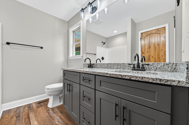 89 Pamela Ct, Ellijay, GA 30540 - full bathroom featuring double vanity, wood finished floors, and a shower