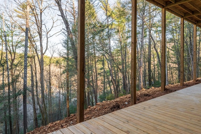 deck featuring a view of trees