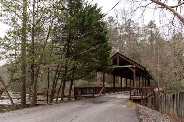 view of home's community with fence