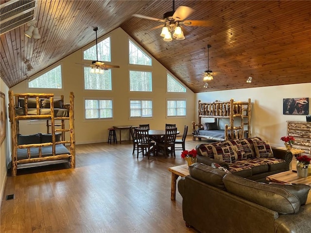 33 Tj Mote Rd, Dahlonega, GA 30533 - living area featuring ceiling fan, wood ceiling, high vaulted ceiling, wood finished floors, and baseboards