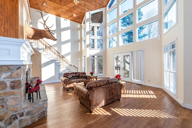 33 Tj Mote Rd, Dahlonega, GA 30533 - living area featuring high vaulted ceiling, a fireplace, wood finished floors, baseboards, and wooden ceiling