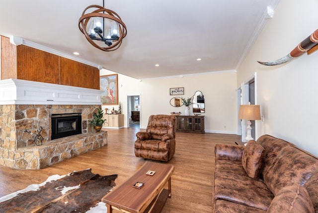 33 Tj Mote Rd, Dahlonega, GA 30533 - living room with crown molding, a stone fireplace, wood finished floors, a chandelier, and recessed lighting