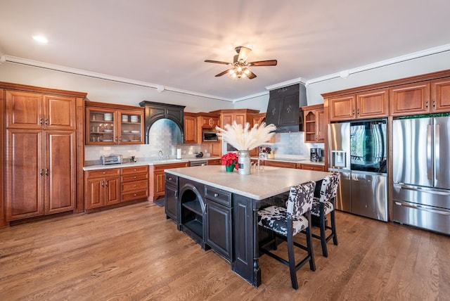 33 Tj Mote Rd, Dahlonega, GA 30533 - kitchen with stainless steel appliances, brown cabinets, light countertops, and ornamental molding