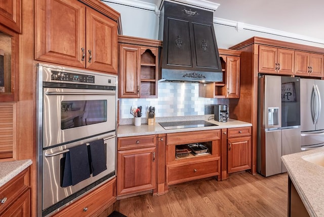 33 Tj Mote Rd, Dahlonega, GA 30533 - kitchen with appliances with stainless steel finishes, open shelves, brown cabinetry, and light wood finished floors