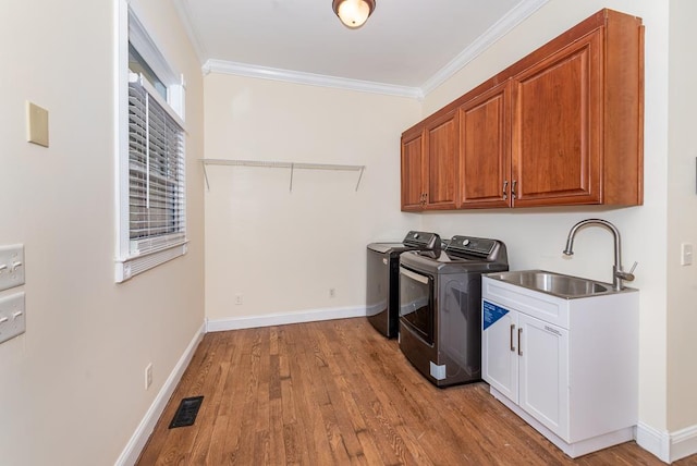 33 Tj Mote Rd, Dahlonega, GA 30533 - laundry area with independent washer and dryer, wood finished floors, crown molding, cabinet space, and baseboards