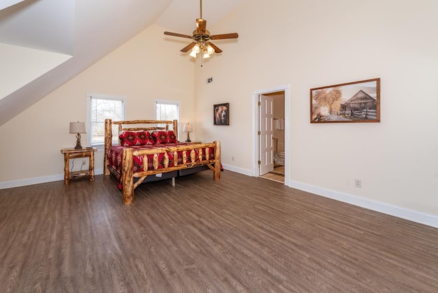 33 Tj Mote Rd, Dahlonega, GA 30533 - bedroom with dark wood-style floors, baseboards, high vaulted ceiling, a ceiling fan, and connected bathroom