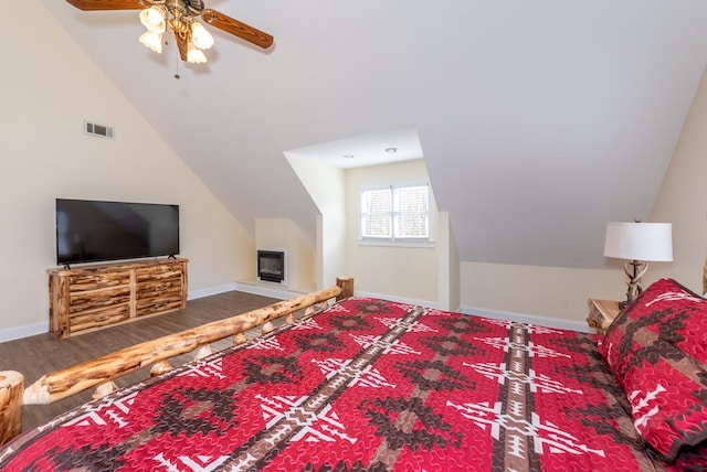 33 Tj Mote Rd, Dahlonega, GA 30533 - bedroom with vaulted ceiling, baseboards, and a ceiling fan