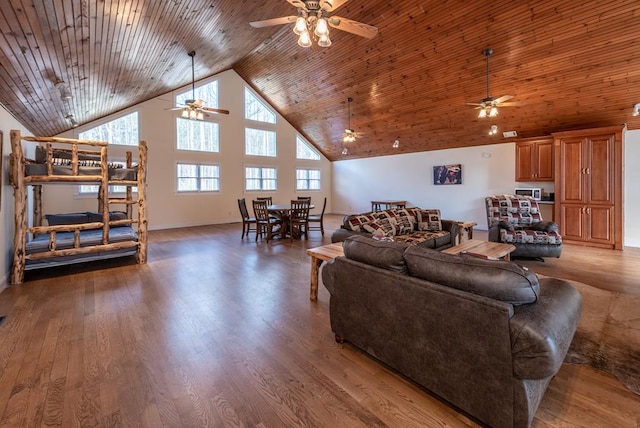 33 Tj Mote Rd, Dahlonega, GA 30533 - living area featuring a ceiling fan, high vaulted ceiling, wooden ceiling, light wood finished floors, and baseboards