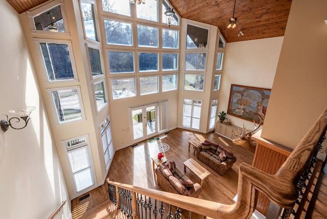33 Tj Mote Rd, Dahlonega, GA 30533 - living area featuring high vaulted ceiling, wood ceiling, french doors, and wood finished floors