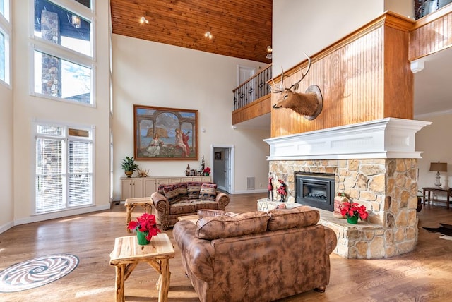 33 Tj Mote Rd, Dahlonega, GA 30533 - living room featuring high vaulted ceiling, a fireplace, wood finished floors, wood ceiling, and baseboards