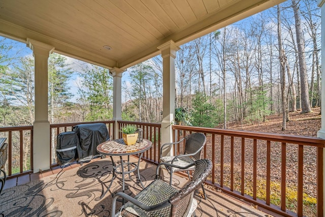 deck featuring area for grilling and covered porch