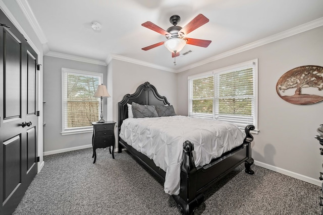 carpeted bedroom with ceiling fan and crown molding