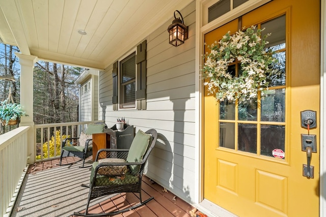 wooden terrace with covered porch